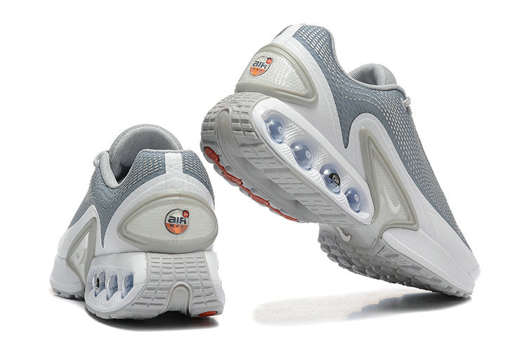 Les baskets Nike Air Max DN combinent un style contemporain et une performance avancée.
Leur design épuré