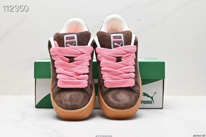 Les baskets Puma Femme se distinguent par leur style audacieux et moderne, alliant des éléments sportifs et urbains. Inspirées des tendances actuelles