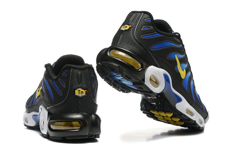 Découvrez les baskets Nike Air Max Plus TN bleu, noir et jaune pour un style unique! Profitez de l'essence légendaire du Tuned Air. ✨