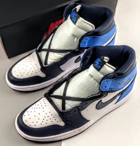 Les  baskets Air Jordan 1 Low "Topaz Mist (GS)" pour femmes offrent une esthétique élégante avec des nuances de Topaz Mist.