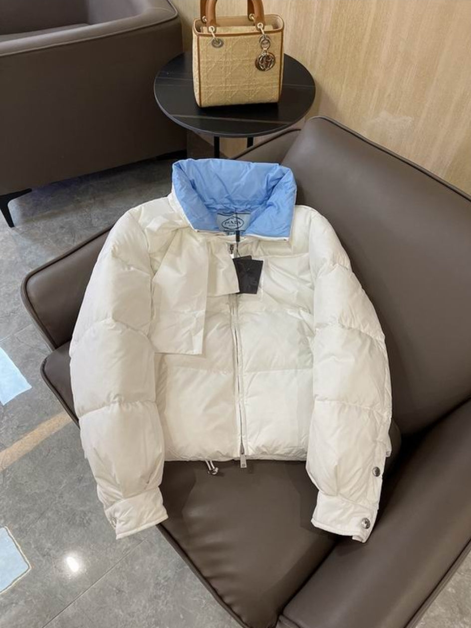 Premièrement : Les doudounes Prada Femme offrent une élégance et une performance inégalées.