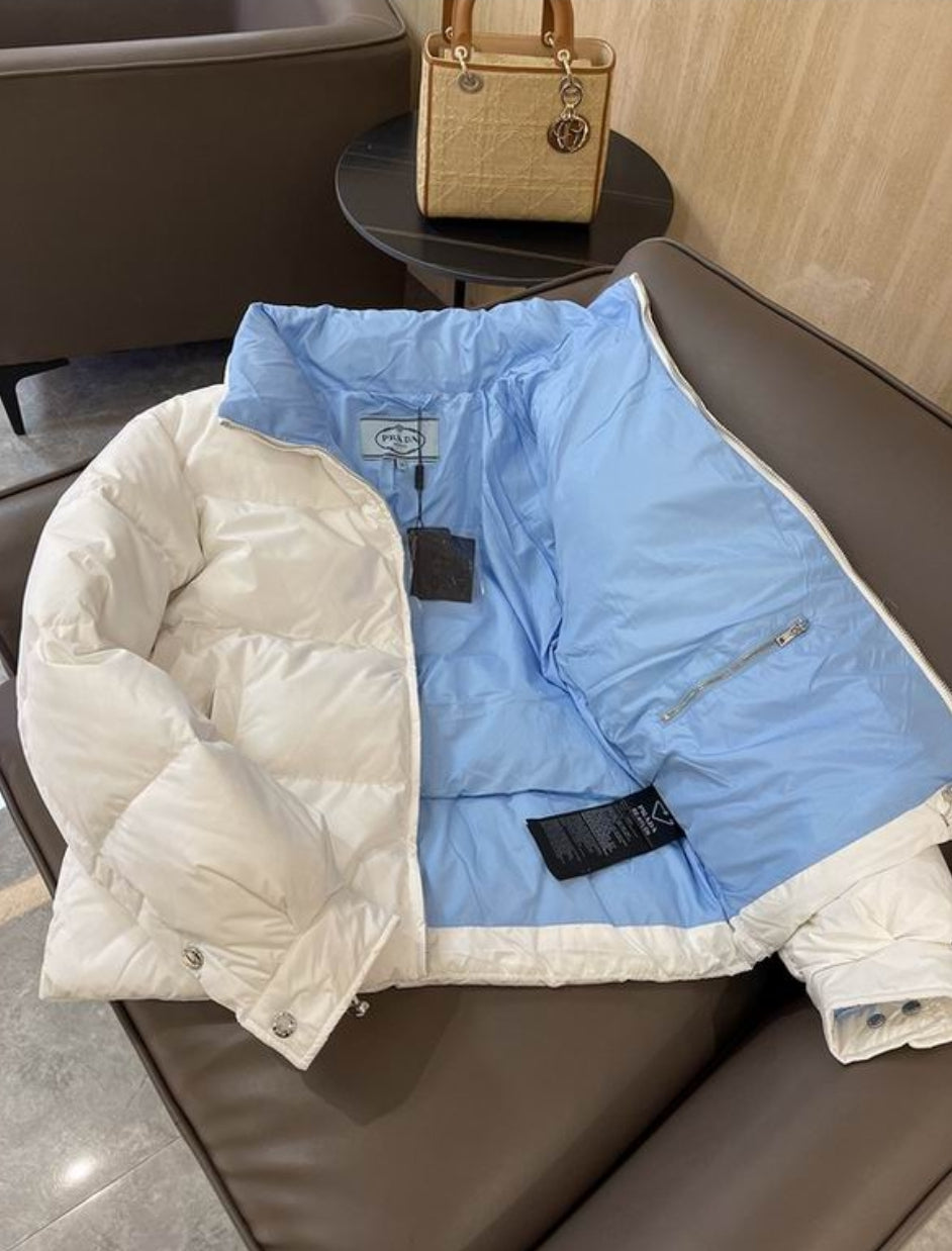 Premièrement : Les doudounes Prada Femme offrent une élégance et une performance inégalées.