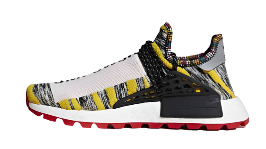 les baskets Adidas Human Race NMD x Pharrell Yellow " Femme  sont un témoignage de l'engagement d'Adidas à combiner style et innovation.