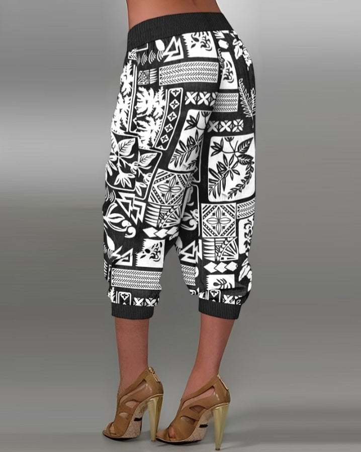 Premièrement : Ce Pantalon capri taille basse à imprimé plante tribales avec boutons décoratifs, pantalon de vacances avec poche femme .