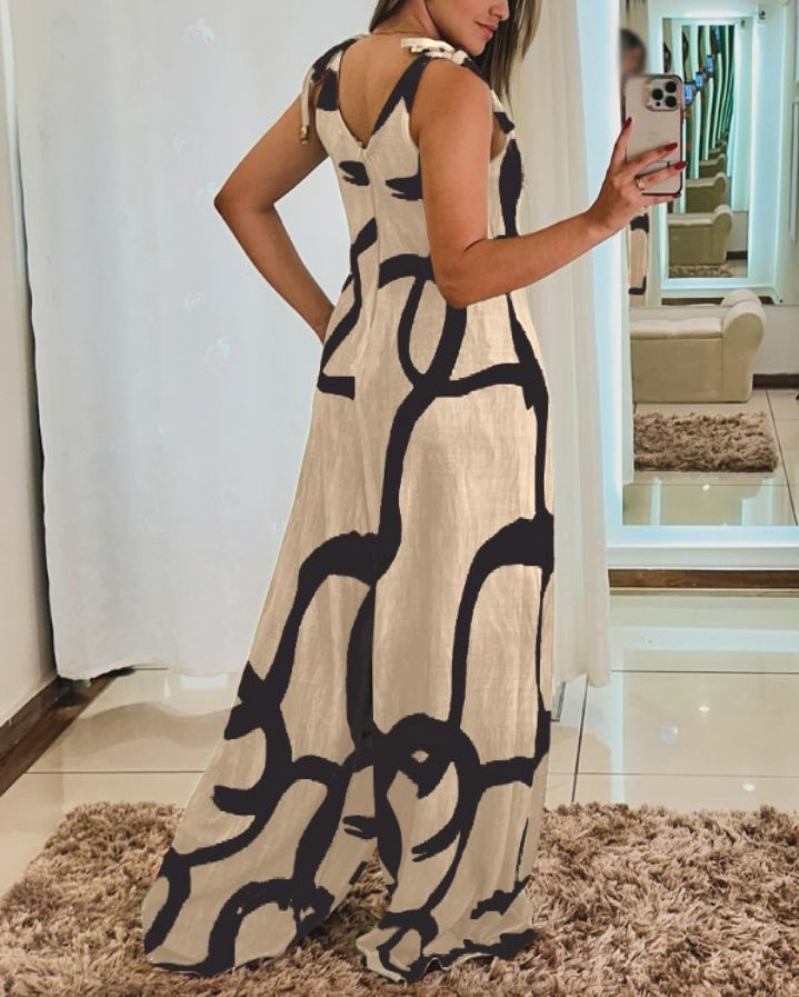 Premièrement : Apportez une touche de fraîcheur et de féminité à votre garde-robe avec cette Combinaison à imprimé floral, col en V, bretelles à lacets , style décontracté avec poches Femme.