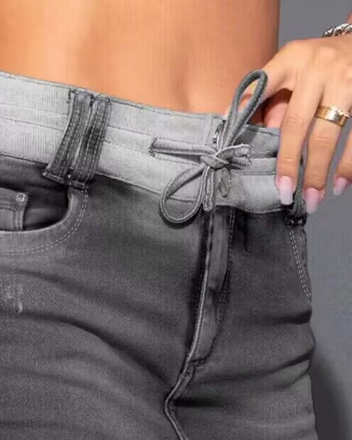 Premièrement : Cette Jupe en jean décontractée à taille réglable avec cordon de serrage Femme.