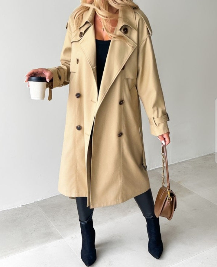 Premièrement : Adoptez un look sophistiqué et indémodable avec ce Trench -coast long croisé à col cranté femme