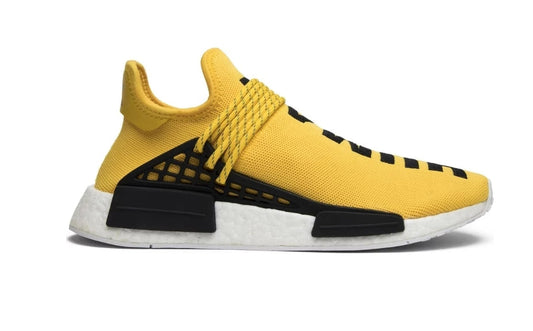 les baskets Adidas Human Race NMD x Pharrell Yellow " Femme  sont un témoignage de l'engagement d'Adidas à combiner style et innovation.