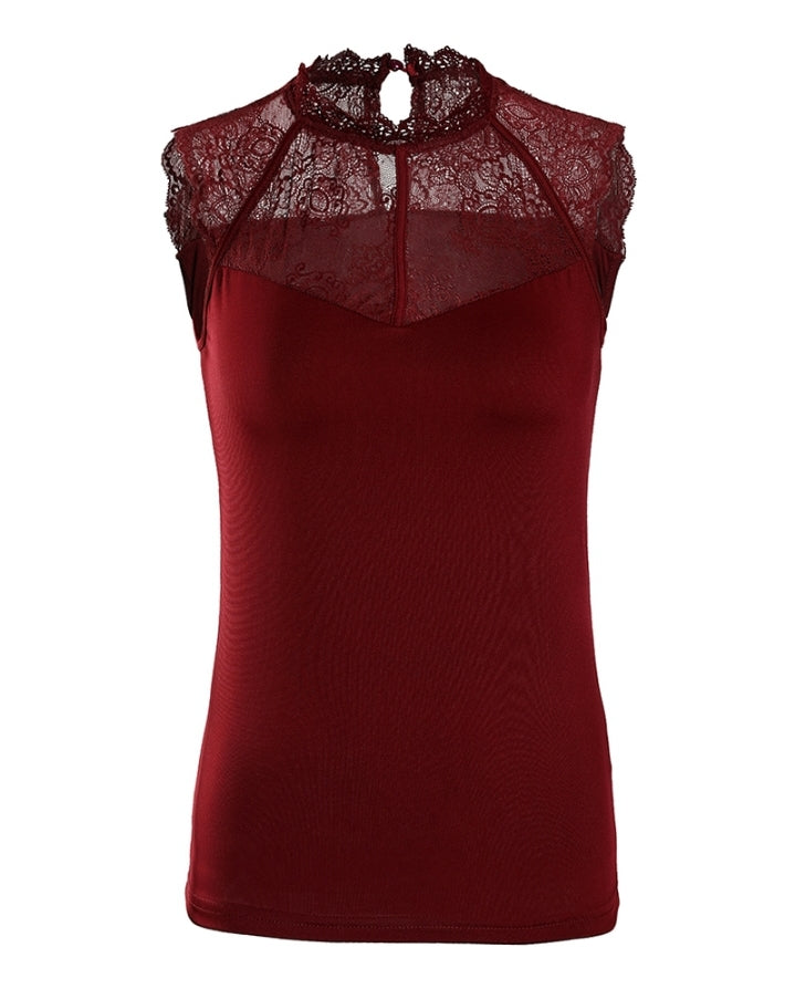 Premièrement : Ce Haut à patchs en dentelle Femme séduit par son style romantique et bohème.