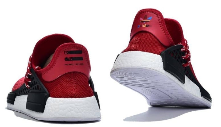 les baskets Adidas Human Race NMD x Pharrell Yellow " Femme sont un témoignage de l'engagement d'Adidas à combiner style et innovation.