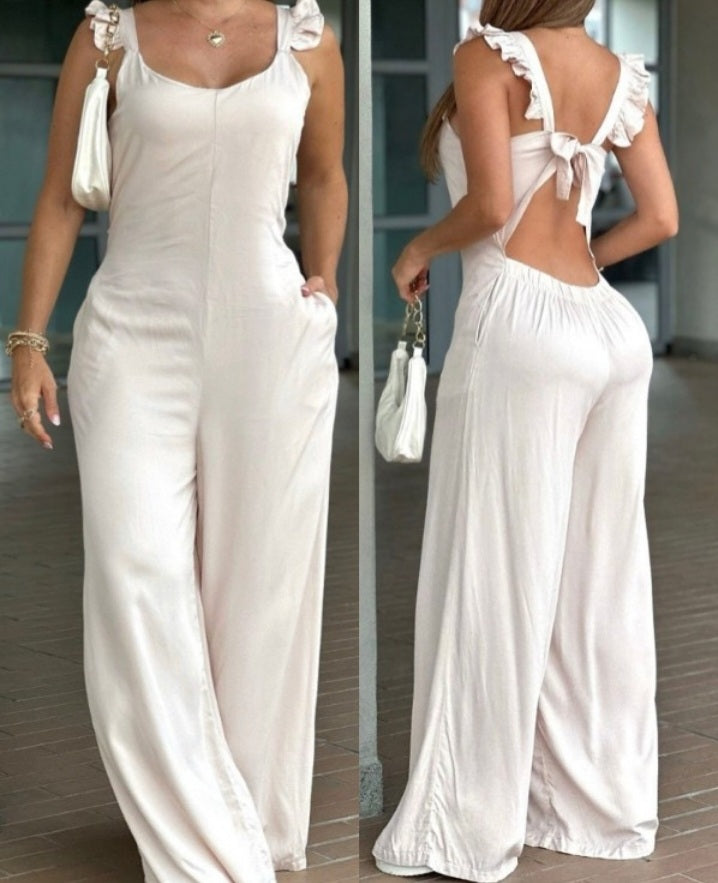 Premièrement : Adoptez un look à la fois décontracté et élégant avec cette Combinaison à encolure dégagée et ourlet à volants avec bretelles spaghetti et poches décontractées et lacets dans le dos femme