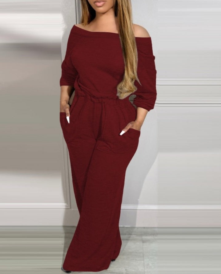 Combinaison à épaules dénudées et dos en V avec poches à la taille extensible femme