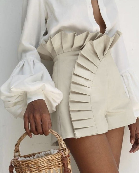 Premièrement : Ce Short taille haute froncé à ourlet volants femme.