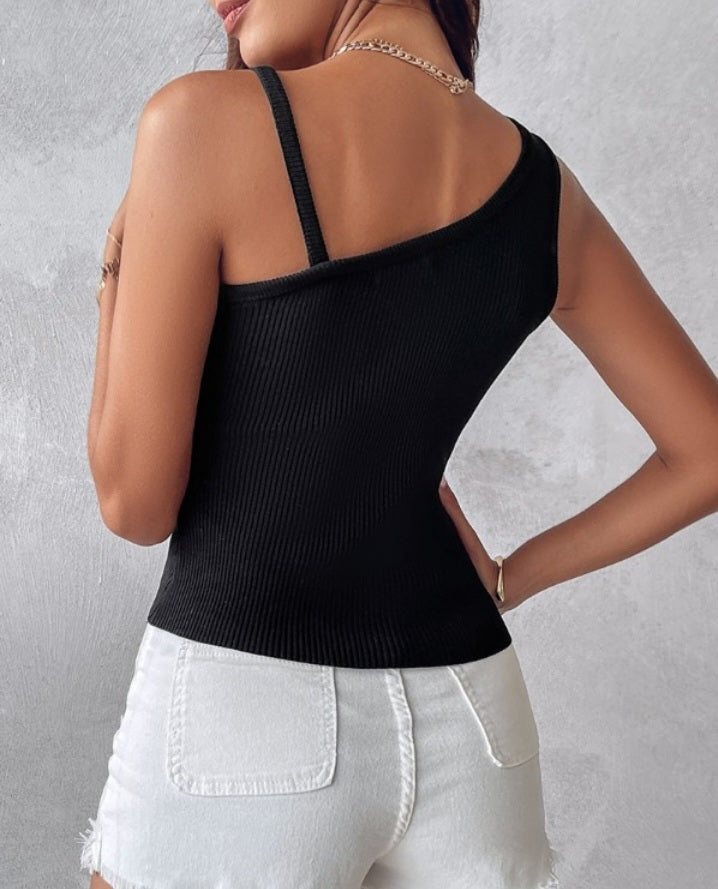 Premièrement : Ce 1 débardeur en tricot à motif floral et perles décoratives sans manches femme.