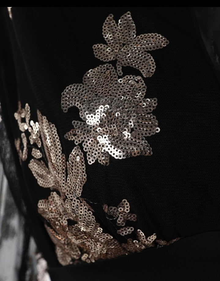 Premièrement : Ce Chemisier à col en V à paillettes contrastées et à fleurs , haut décontracté en maille transparente avec taille cintrée femme.