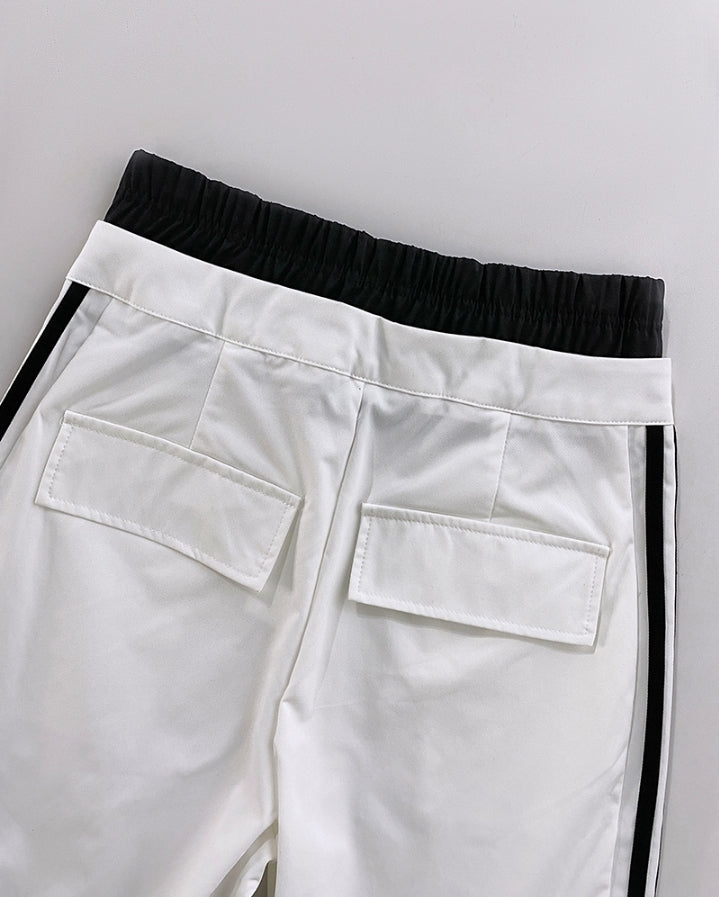 Premièrement : Ce Pantalon cargo taille haute extensible froncé à bandes rayées et poches Femme.