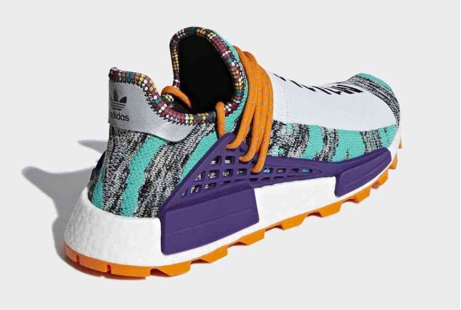 les baskets Adidas Human Race NMD x Pharrell Yellow " Femme sont un témoignage de l'engagement d'Adidas à combiner style et innovation.