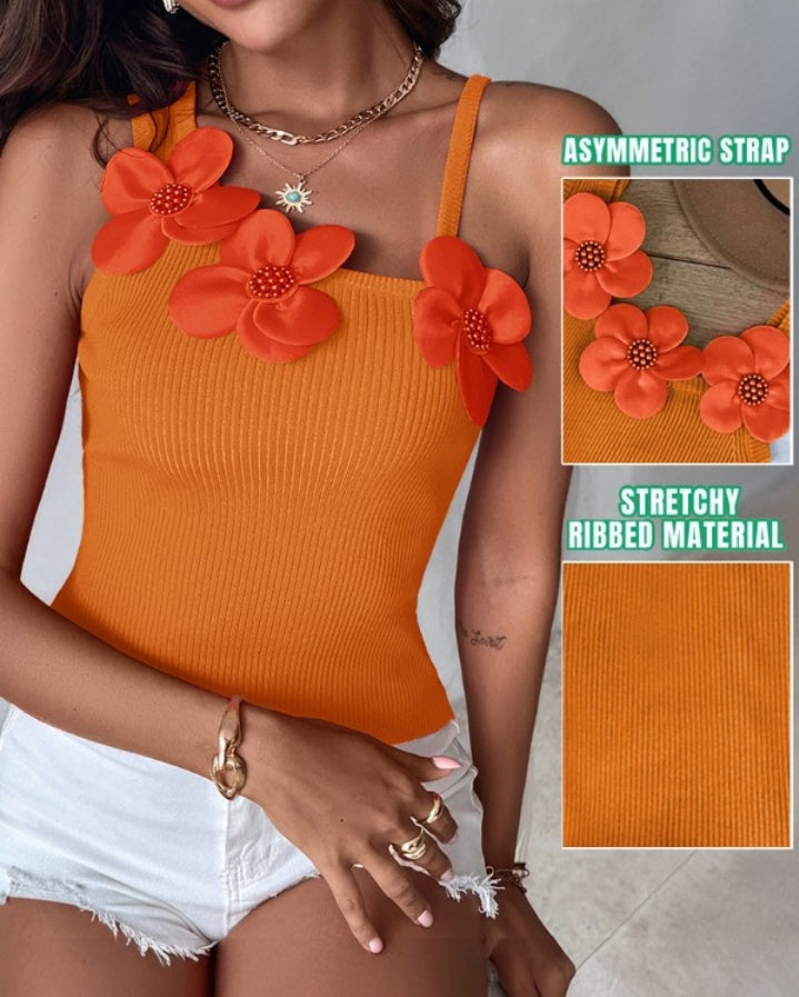 Premièrement : Ce 1 débardeur en tricot à motif floral et perles décoratives sans manches femme.