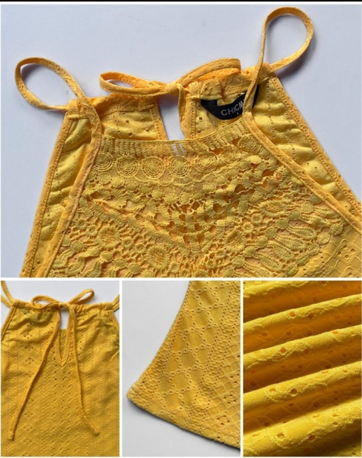 Premièrement : Ce débardeur sans manches en dentelle contrastée texturée, coupe slim décontractée Femme