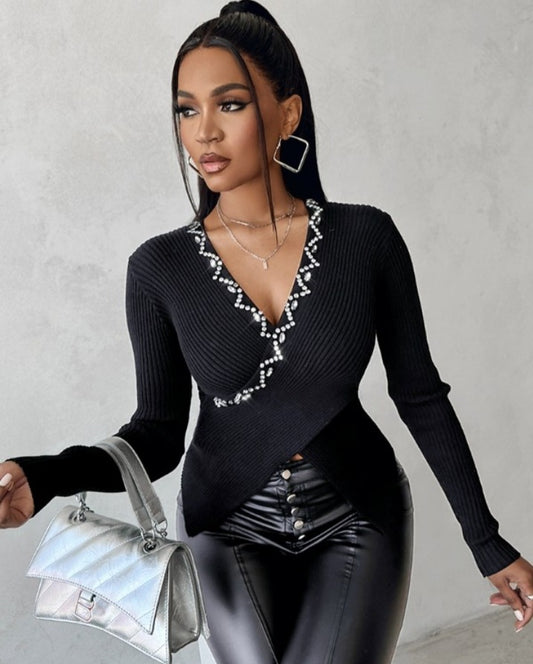 Pull en tricot à decor de Strass superposés