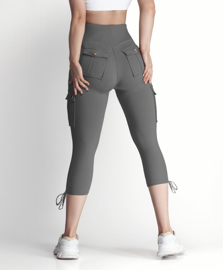 Premièrement : Ce Legging de motard taille haute avec poches à rabat pour soulever les fesses.