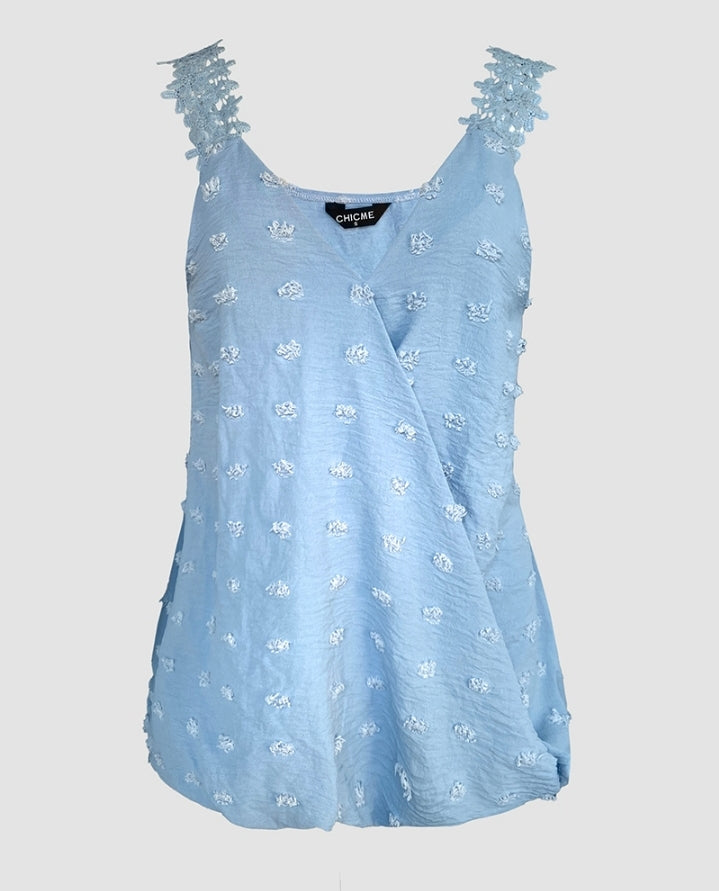 Premièrement : Ce Débardeur décontracté sans manches à imprimé jacquard à pois et sangles croisées femme.