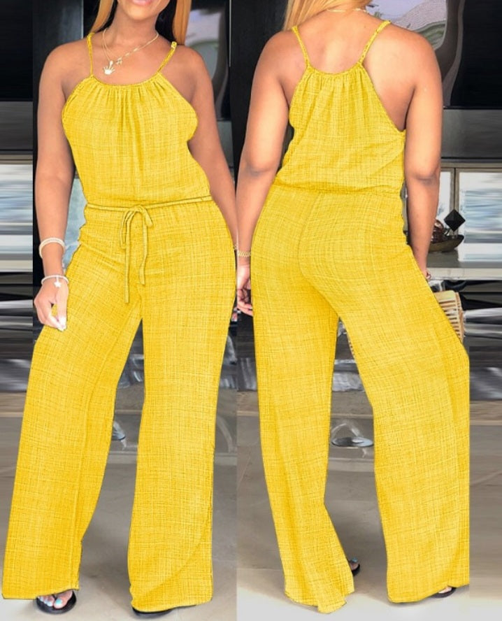 Premièrement : Adoptez un style chic et décontracté avec cette Combinaison courte décontractée à pois , et froncées sans manches avec détails noués et boutons décoratifs femme