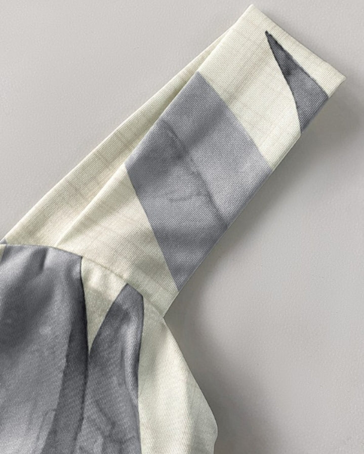 Premièrement : Cette robe longue décontractée à bretelles épaisses et imprimé végétal, coupe ajustée et fendue avec poches Femme.