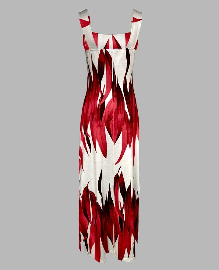 Premièrement : Cette robe longue décontractée à bretelles épaisses et imprimé végétal, coupe ajustée et fendue avec poches Femme.
