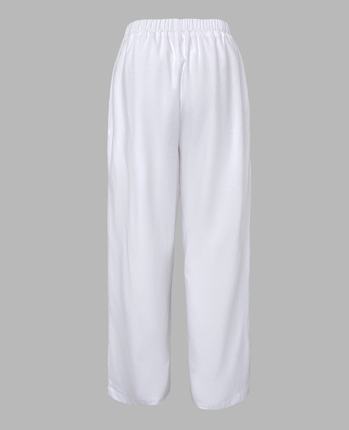 Premièrement : Ce Pantalon décontracté droit à cordons froncées Femme pour incarne l’équilibre parfait entre aisance et élégance au quotidien.