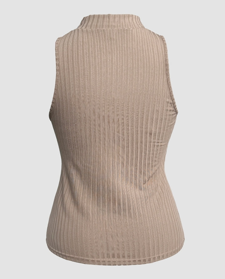 Premièrement : Ce Débardeur décontracté côtelé à col rond et coupe ajustée avec fermeture éclair et bretelles épaisses femme.