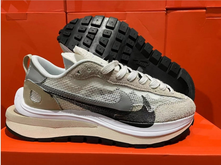 Les Baskets Nike LDWaffle x Sacai combinent style audacieux et innovation. Leur design surdimensionnées . Pas cher. Le moins cher.