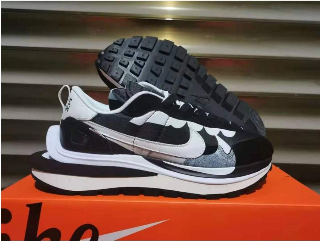 Les Baskets Nike LDWaffle x Sacai combinent style audacieux et innovation. Leur design surdimensionnées . Pas cher. Le moins cher.