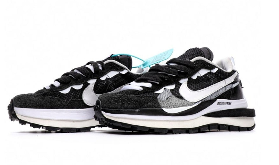 Les Baskets Nike LDWaffle x Sacai combinent style audacieux et innovation. Leur design surdimensionnées . Pas cher. Le moins cher.