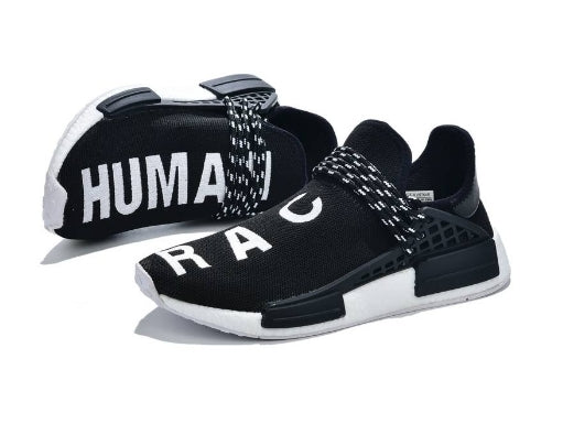 les baskets Adidas Human Race NMD x Pharrell Yellow " Femme sont un témoignage de l'engagement d'Adidas à combiner style et innovation.
