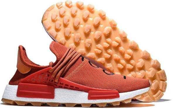 les baskets Adidas Human Race NMD x Pharrell Yellow " Femme sont un témoignage de l'engagement d'Adidas à combiner style et innovation.