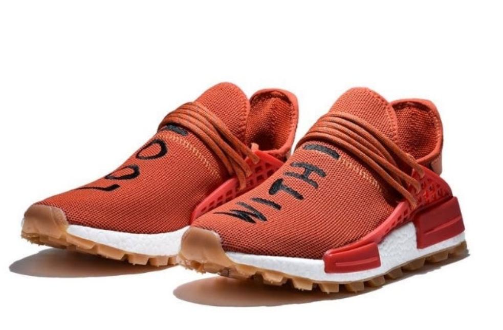 les baskets Adidas Human Race NMD x Pharrell Yellow " Femme sont un témoignage de l'engagement d'Adidas à combiner style et innovation.