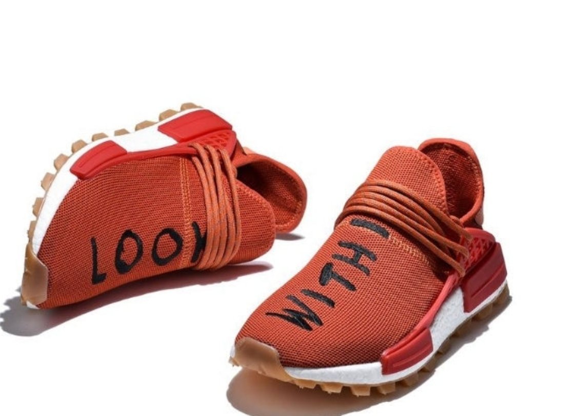 les baskets Adidas Human Race NMD x Pharrell Yellow " Femme sont un témoignage de l'engagement d'Adidas à combiner style et innovation.