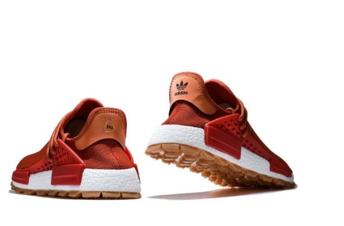 les baskets Adidas Human Race NMD x Pharrell Yellow " Femme sont un témoignage de l'engagement d'Adidas à combiner style et innovation.