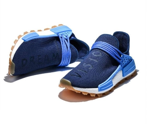les baskets Adidas Human Race NMD x Pharrell Yellow " Femme sont un témoignage de l'engagement d'Adidas à combiner style et innovation.
