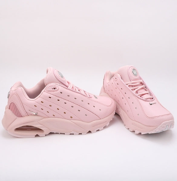 Les baskets Nike Hot Step Air Terra x NOCTA "Pink" Femme, issues de la collaboration entre Nike et NOCTA.
