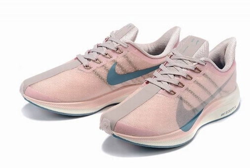 Les baskets Nike Air Zoom Femme se démarquent par leur design sportif et moderne, conçu pour maximiser les performances exceptionnelles