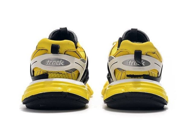 les sneakers Balenciaga Triple S "Beige Green Yellow" Femme sont un témoignage de l'engagement de Balenciaga à combiner style et innovation.