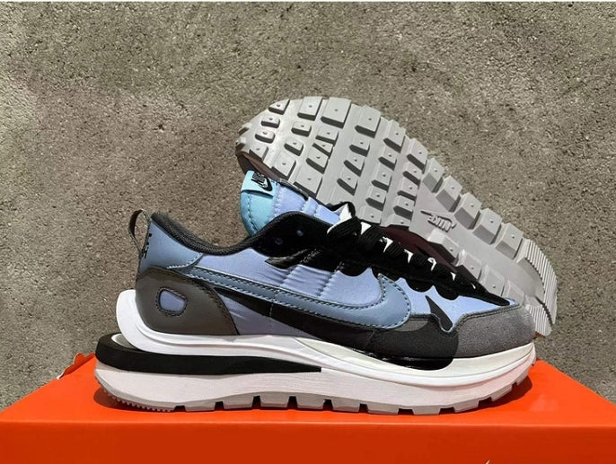 Les Baskets Nike LDWaffle x Sacai combinent style audacieux et innovation. Leur design surdimensionnées . Pas cher. Le moins cher.