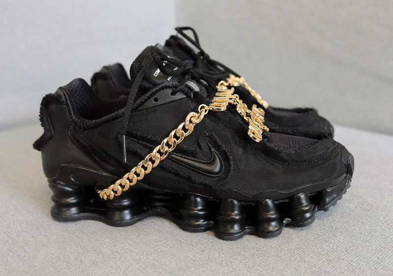 Le modèle baskets  Nike Shox TL Femme illustre l’engagement de Nike pour l'innovation et le design avant-gardiste.