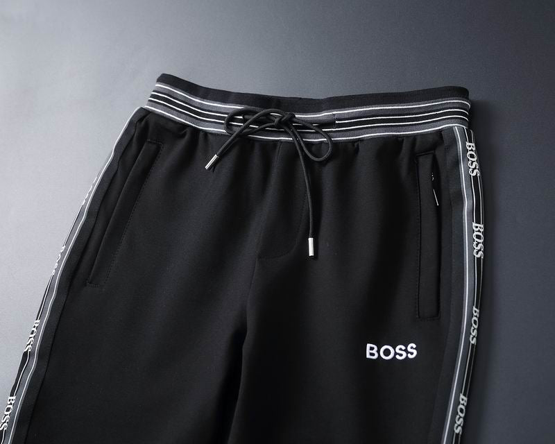 Les ensembles survêtement Hugo Boss allient performance et style. Leur design sophistiqué et leur qualité supérieure.pas cher.le moins cher.
