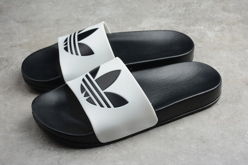 Les sandales claquettes Adidas sont un incontournable pour ceux qui recherchent un mélange parfait entre confort et style décontracté.