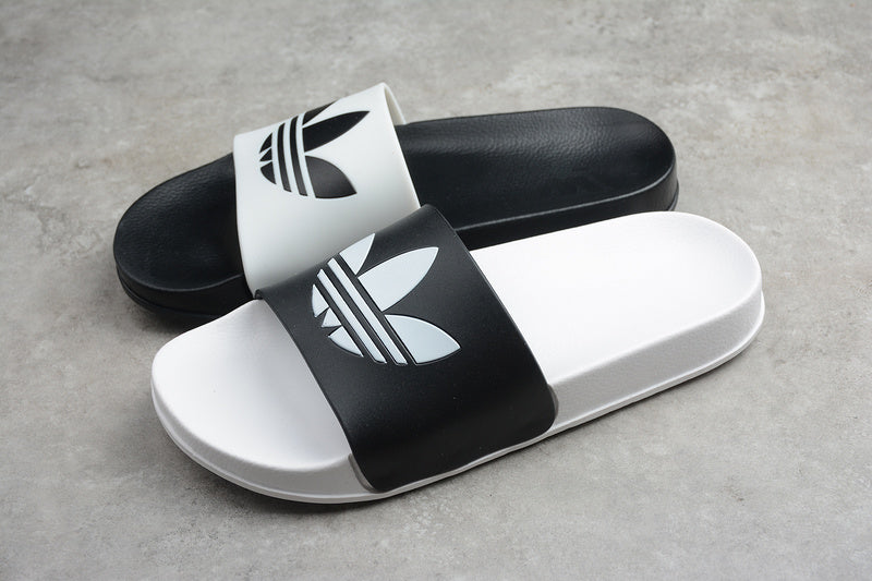 Les sandales claquettes Adidas sont un incontournable pour ceux qui recherchent un mélange parfait entre confort et style décontracté.