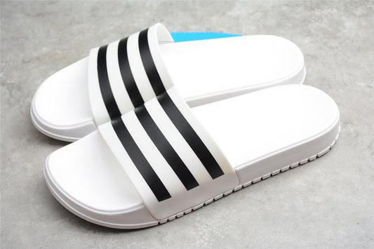 Les sandales claquettes Adidas sont un incontournable pour ceux qui recherchent un mélange parfait entre confort et style décontracté.