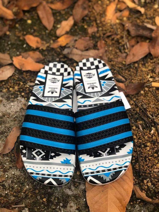 Les sandales claquettes Adidas sont un incontournable pour ceux qui recherchent un mélange parfait entre confort et style décontracté.